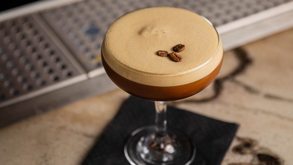 A tempting espresso martini cocktail, a delightful blend of coffee and spirits.